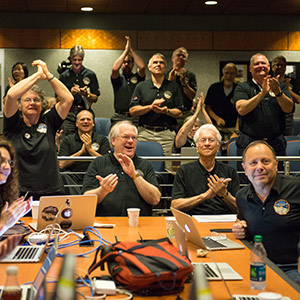 Part of the New Horizons team celebrating the spacecraft's flyby of Pluto.